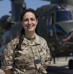Kathy Morton in front of a Royal Air Force aircraft.
